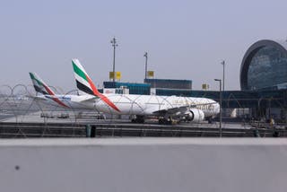 Planes are parked at Terminal 3 of the Dubai International Airport, following the United States and Israel strikes on Iran, in Dubai